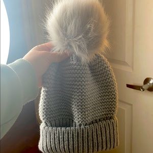 gray puff ball winter hat